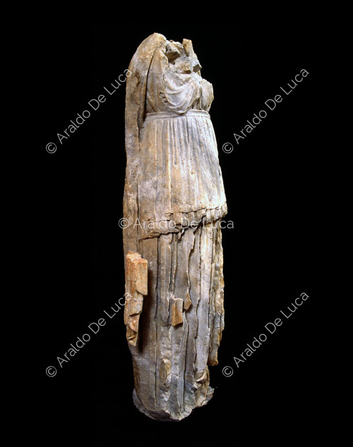 Headless female statue
